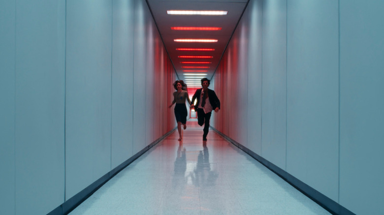 Mark S. and Helly R. running down the halls of Lumon in Severance Season 2