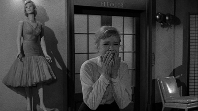 Marsha screaming on the ninth floor of the department store in front of an elevator and mannequin on The Twilight Zone