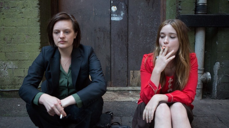 Elisabeth Moss and Alice Englert smoking