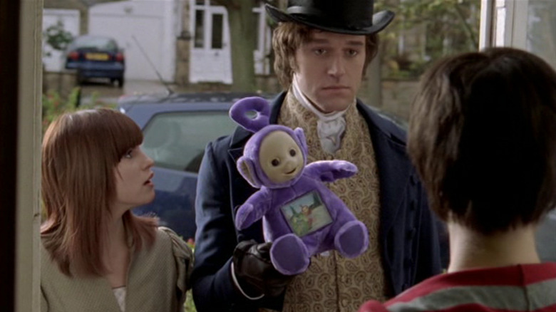 Fitzwilliam Darcy holding a teletubby