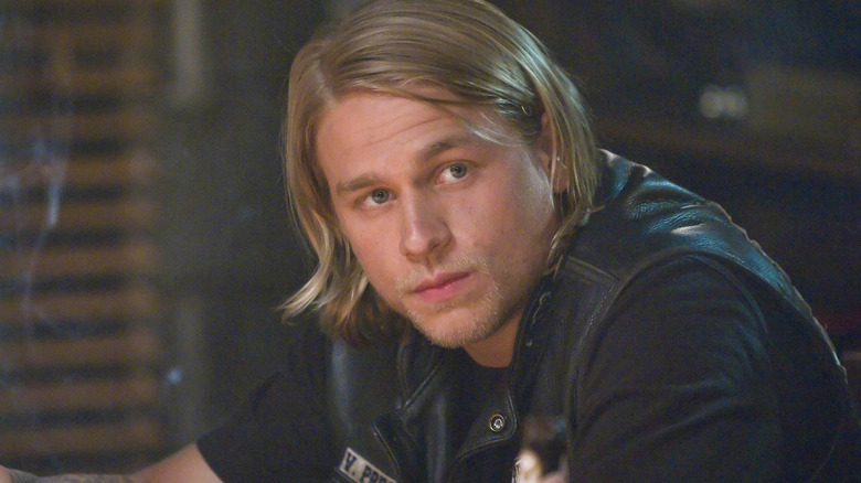 Charlie Hunnam staring