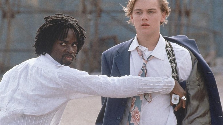 Mercutio grabs Romeo's gun in Romeo + Juliet (1996)