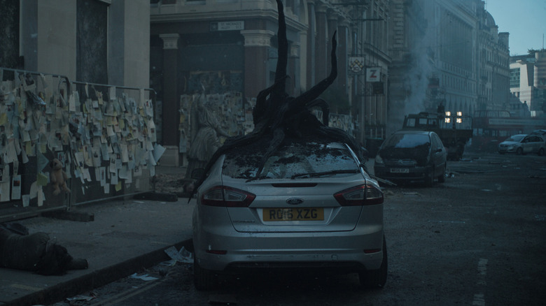 Invasion season 2 alien on car 