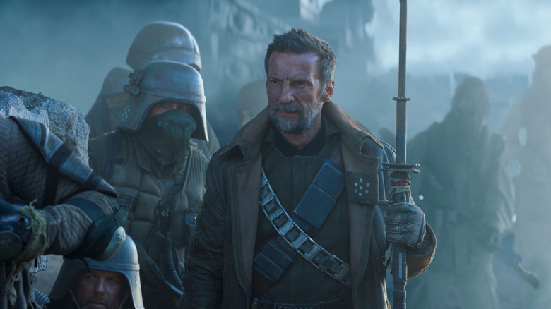 Mathieu Kassovitz's General Strix holding a staff on Star Wars: Skeleton Crew