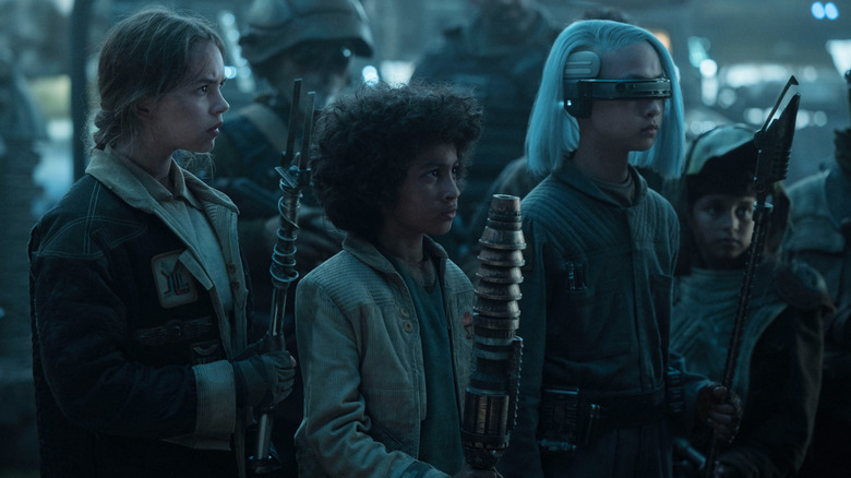 Fern, Wim, and KB holding weapons in Star Wars: Skeleton Crew