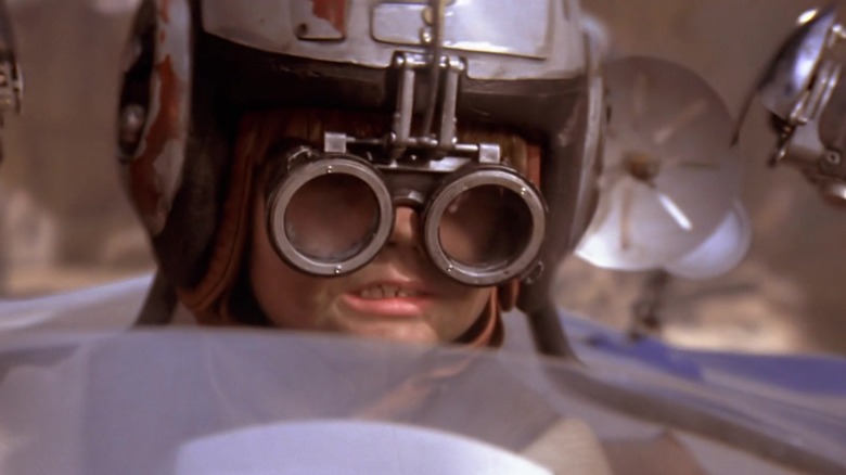 Jake Lloyd as Anakin Skywalker racing in his podracer in Star Wars: The Phantom Menace