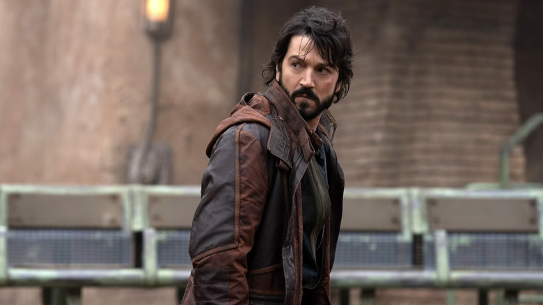 Diego Luna as Cassian Andor on Andor looking over his shoulder