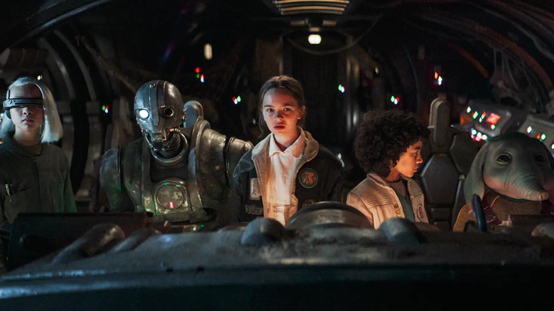 KB, SM-33, Fern, Wim, and Neel sitting in a cockpit in Star Wars: Skeleton Crew