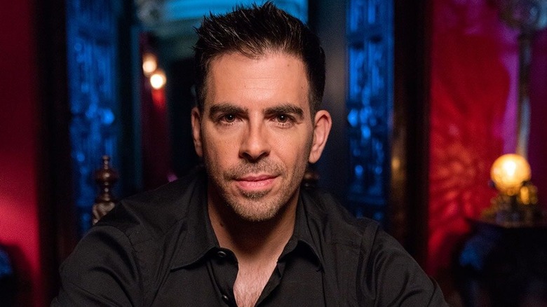 Eli Roth poses for A Ghost Ruined My Life