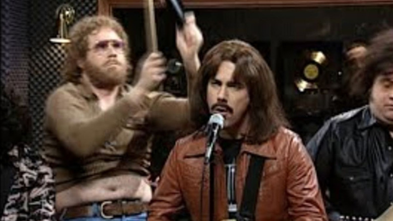 Will Ferrell Plays Cowbell Behind Chris Parnell in more sketch Cowbell Saturday Night Live