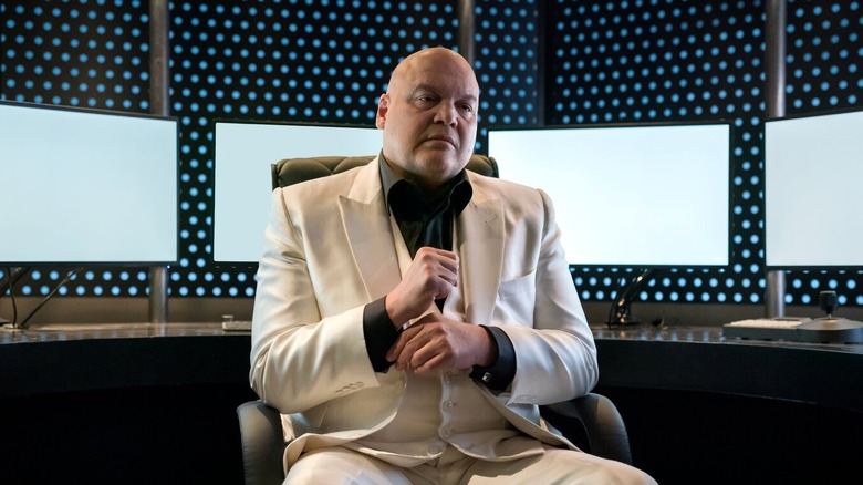 Daredevil screenshot showing Vincent D'Onofrio as Wilson Fisk/Kingpin sitting in a white suit