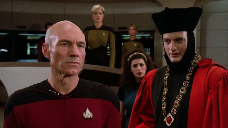 Q taunting Picard on the Enterprisee