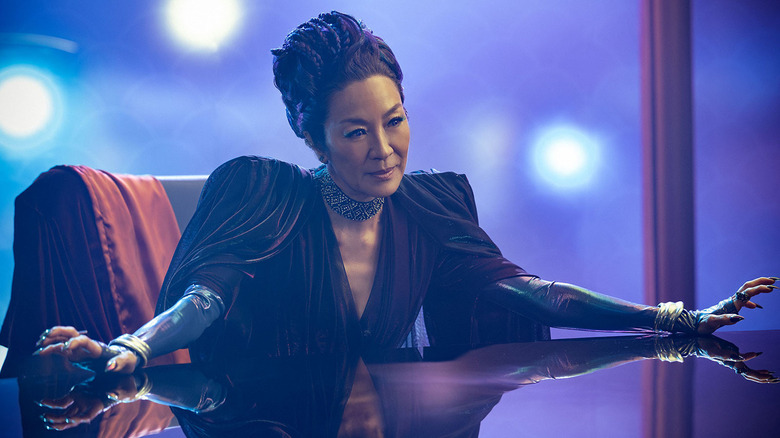 Michelle Yeoh as Philippa Georgiou sitting at her desk in Star Trek: Section 31