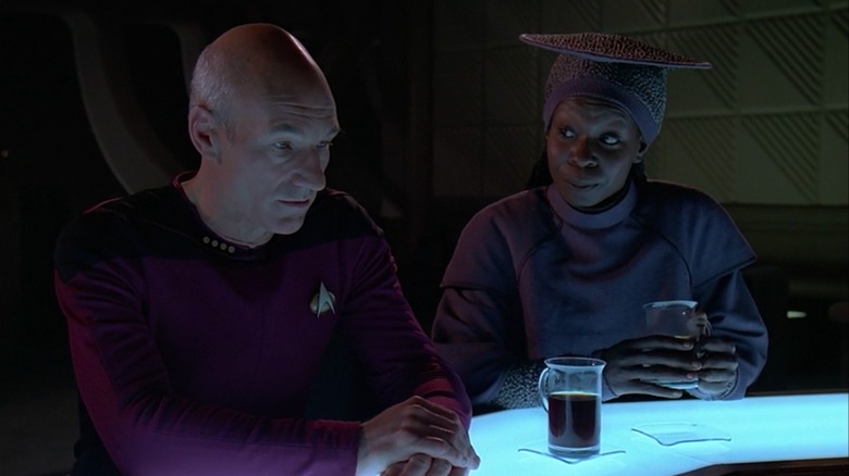 Picard (Stewart) and Guinan (Whoopi Goldberg) discuss the ramifications of personhood in TNG's The Measure of a Man