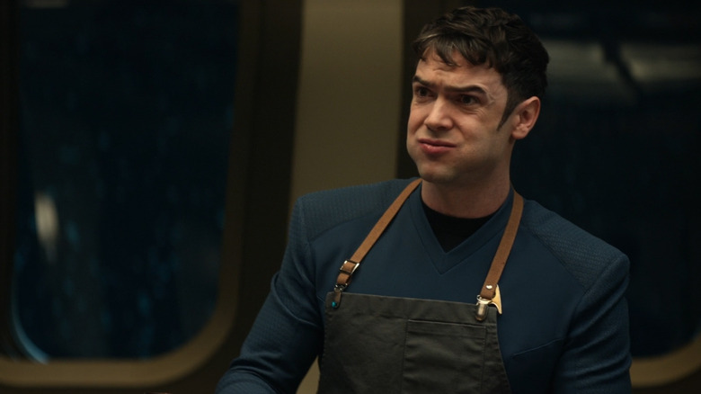 Spock (Ethan Peck) is disgusted with his mouth full in Star Trek: Strange New Worlds