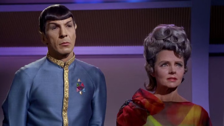 Spock (Leonard Nimoy) stands next to Amanda Grayson (Jane Wyatt) in Star Trek: The Original Series