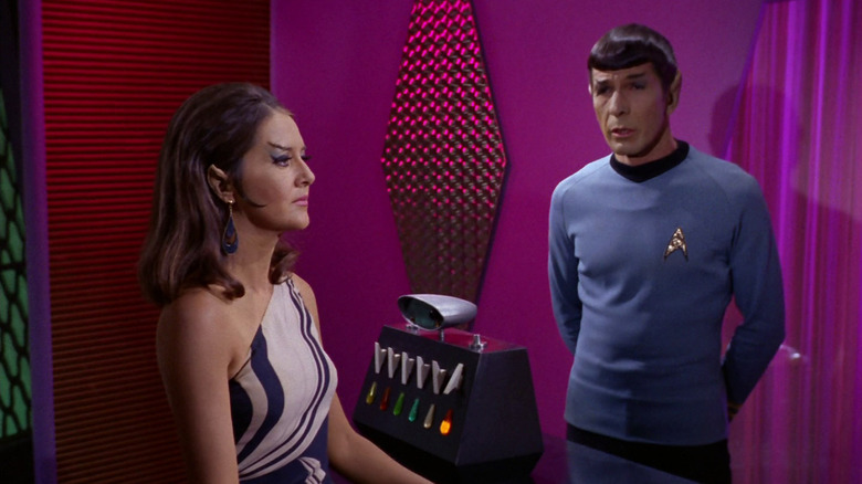 Spock (Leonard Nimoy) speaks with the Romulan commander (Joanne Linville) in Star Trek: The Original Series