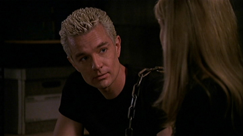 Spike with a chain over his shoulder, talking to Buffy on Buffy the Vampire Slayer