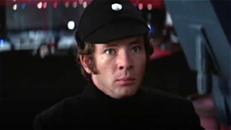 An Imperial officer looks alarmed