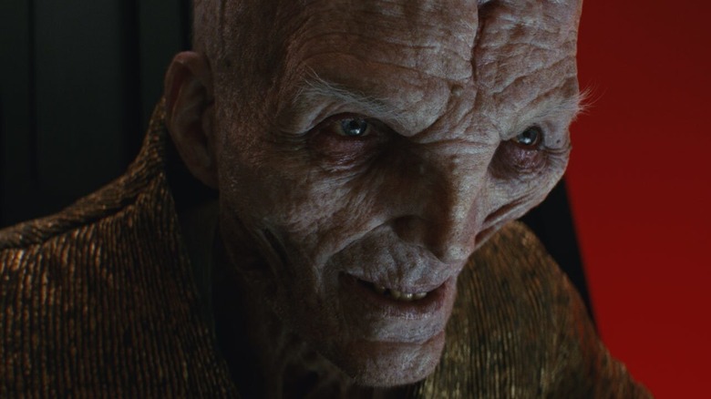 Superme Leader Snoke sitting on hits throne, smirking in Star Wars: The Last Jedi