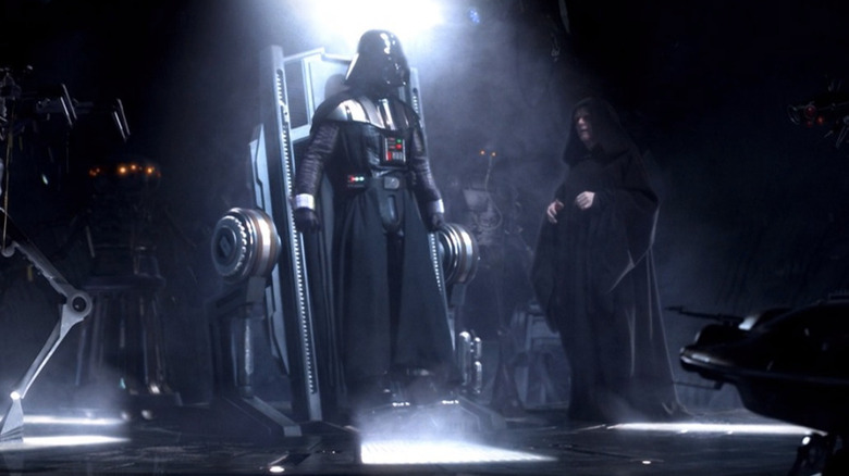 Palpatine standing with Darth Vader