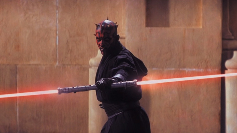 Darth Maul fighting with a double lightsaber