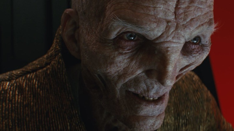 Supreme Leader Snoke sits in his throne