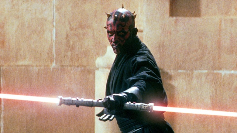 Darth Maul face wield double lightsaber