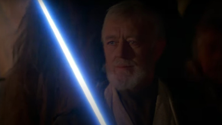 Obi-Wan Kenobi brandishing lightsaber