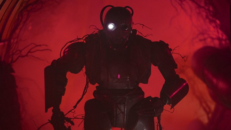 SM-33 standing against a red background in Star Wars: Skeleton Crew