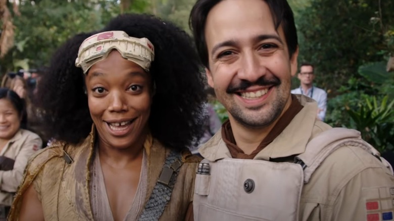 Lin-Manuel Miranda and Naomi Ackie on the set