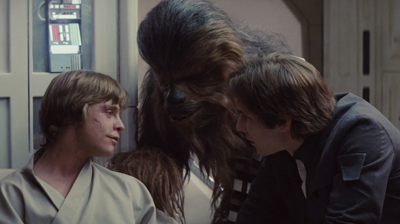 Mark Hamill, Peter Mayhew, and Harrison Ford in The Empire Strikes Back