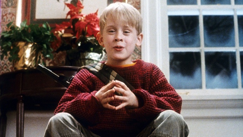 Macaulay Culkin taunting the Wet Bandits in Home Alone