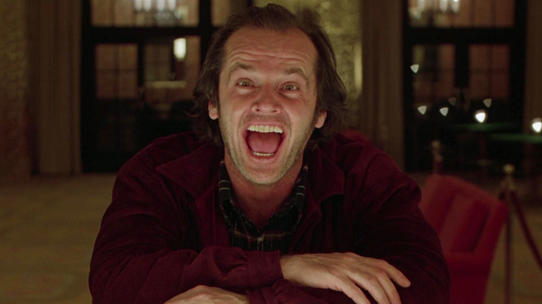 Jack Nicholson as Jack Torrance laughing at the bar in The Shining