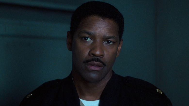 Lieutenant Commander Dr. Jerome Davenport is talking to someone in a dark room.