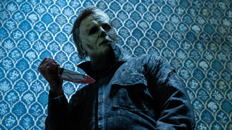 Michael Myers holding a bloody knife in Halloween Ends