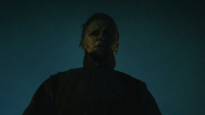 Michael Myers looking down at the camera in Halloween Ends