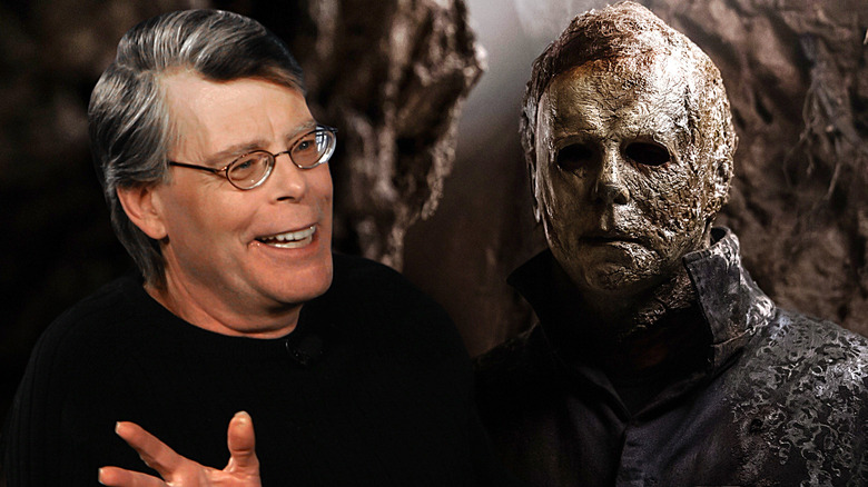 Stephen King smiling next to Michael Myers