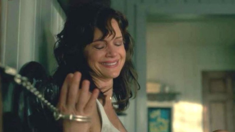 Carla Gugino chained to bed