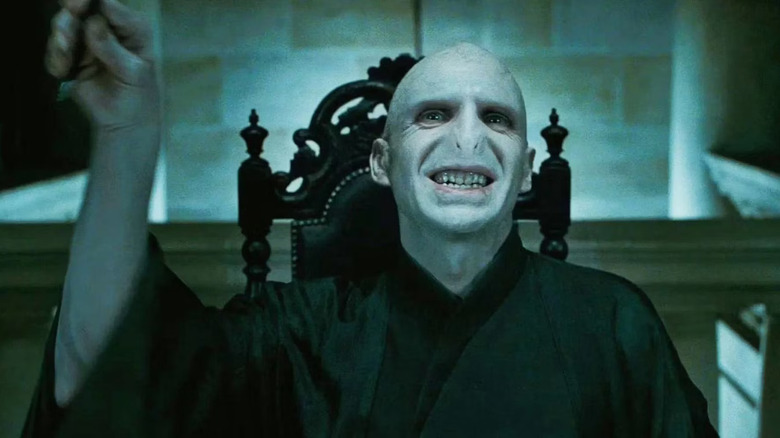 Voldemort grinning casting spell Harry Potter