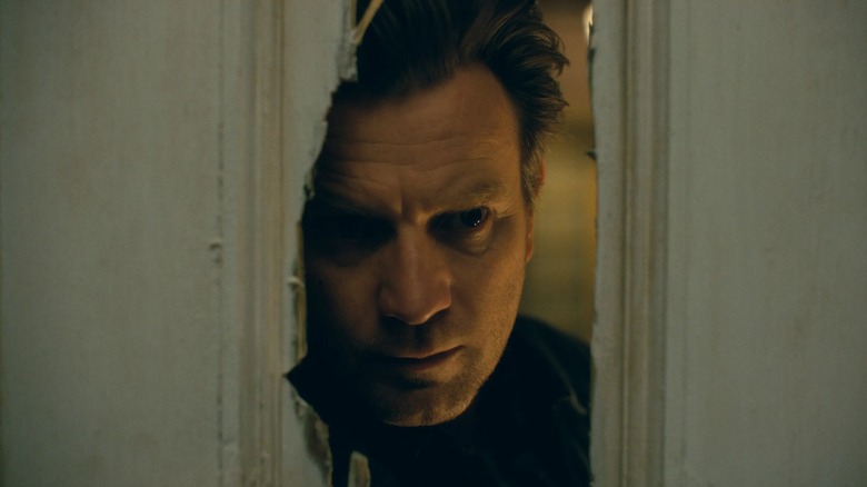 Danny (Ewan McGregor) revisits the Overlook Hotel room his father broke into in Doctor Sleep