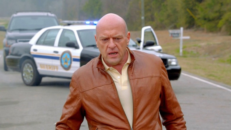 Big Jim (Dean Norris) inspects a situation on the road in Under the Dome