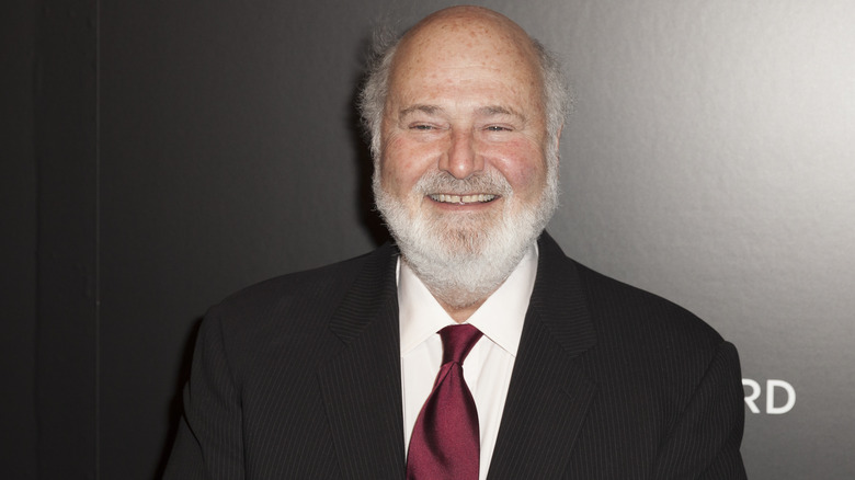 Rob Reiner smiling suit