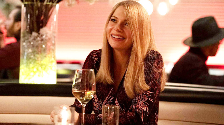 Michelle Williams smiling in Venom: Let There Be Carnage