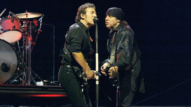 Bruce Springsteen and Steven Van Zandt performing on stage
