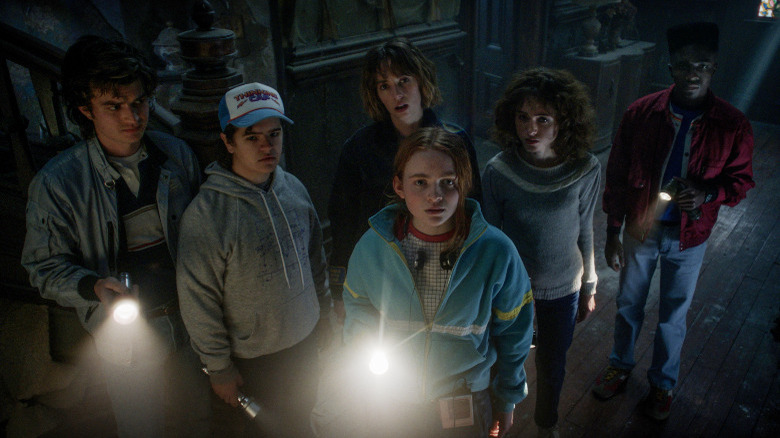 The heroes investigate Creel House in Stranger Things 4