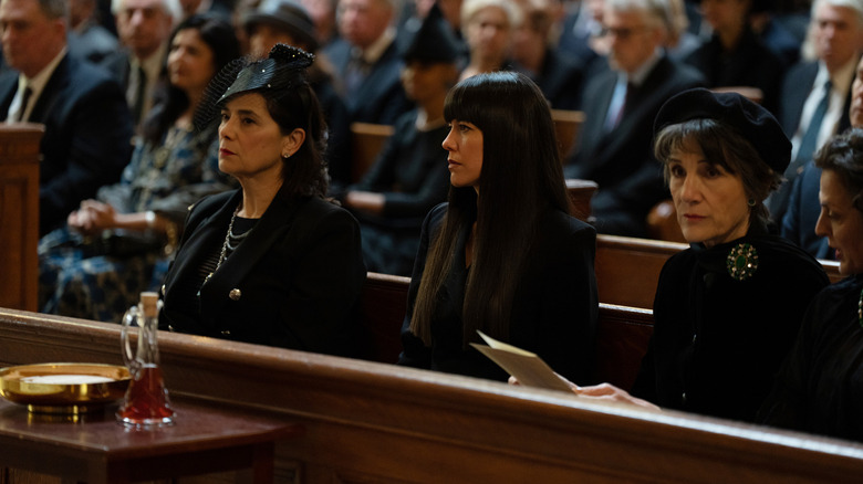 Women at the funeral in Succession