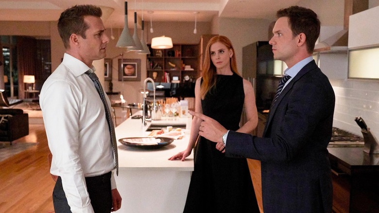 Sarah Rafferty, Gabriel Macht and Patrick J. Adams in Suits 