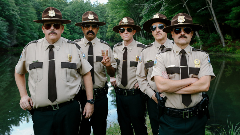 Farva, Thorny, Rabbit, Foster, and Mac standing lakeside in Super Troopers 2