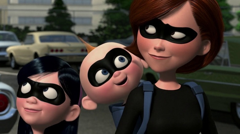 Violet, Jack-Jack, and Helen wearing masks in The Incredibles